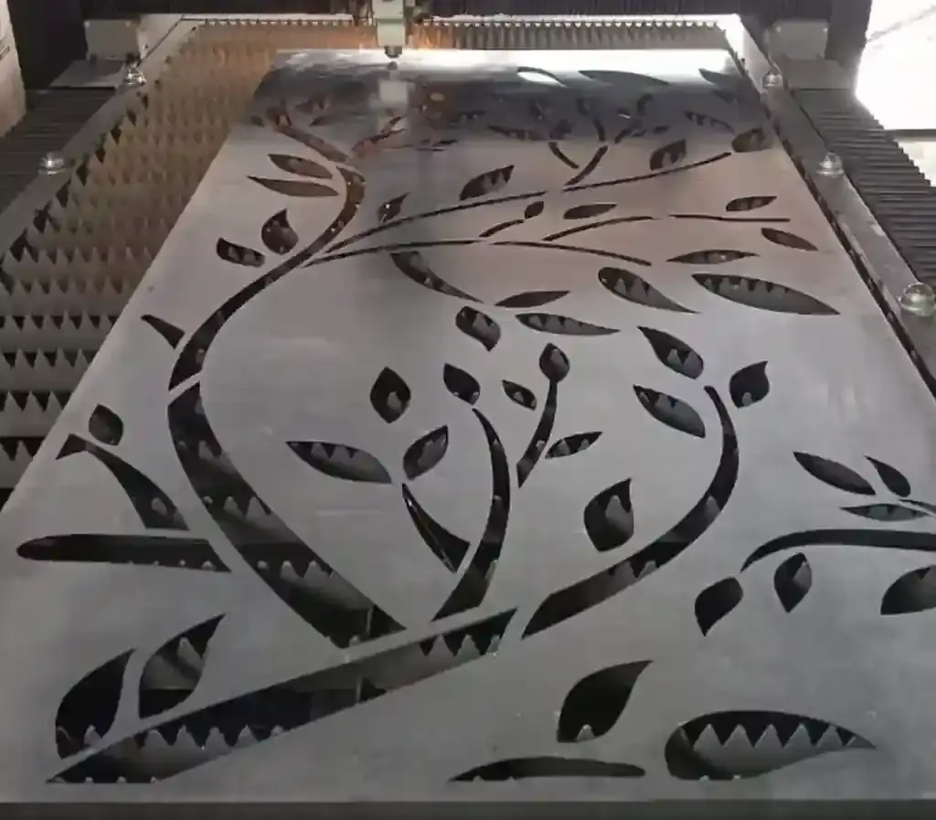 Susunan nesting berbagai part pada satu lembar material laser cutting